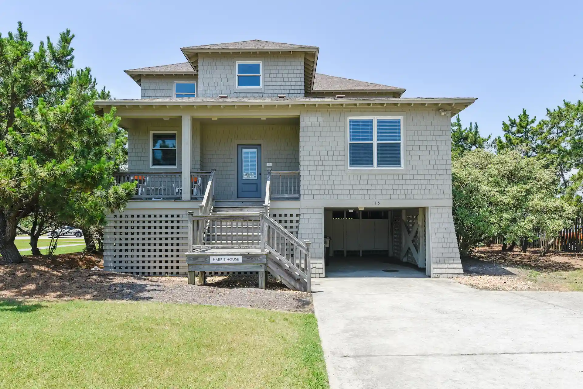 Exterior view of the Harris 3 Bedroom Residence, showcasing its elegant architecture and spacious design.