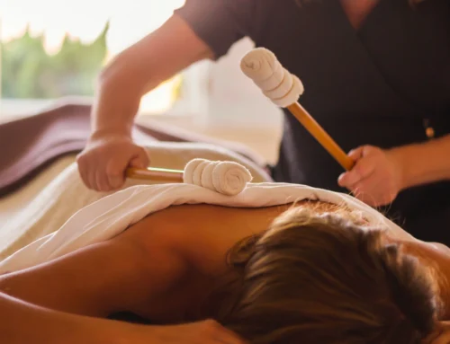 Homepage 9 Woman enjoying a percussion massage at The Sanderling Hotel's spa