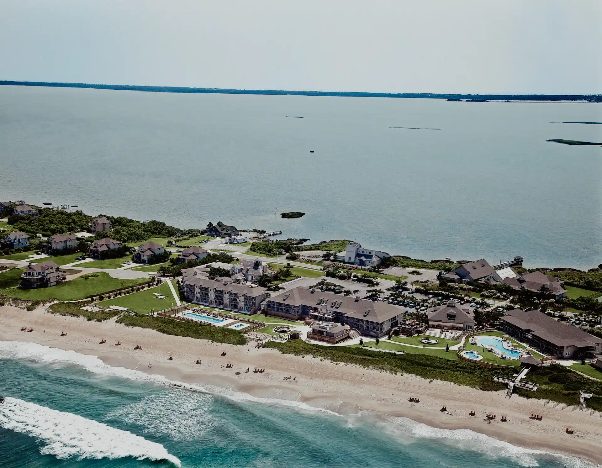 property_arialfinal Private beaches at The Sanderling Hotel, offering exclusive seaside relaxation and breathtaking coastal views